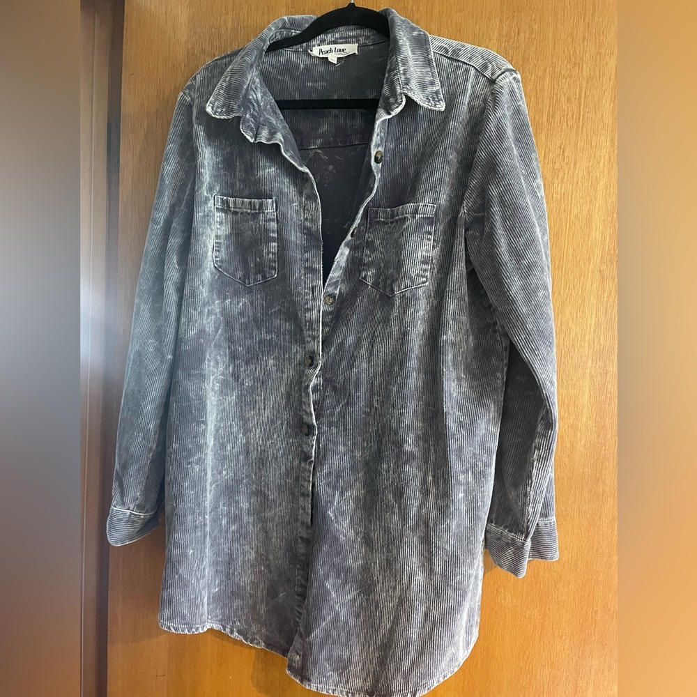 Distressed material button up. Never worn